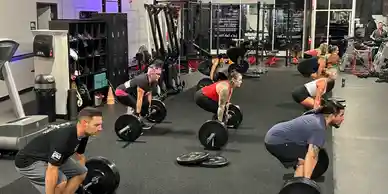 Bootcamp class doing deadlift training