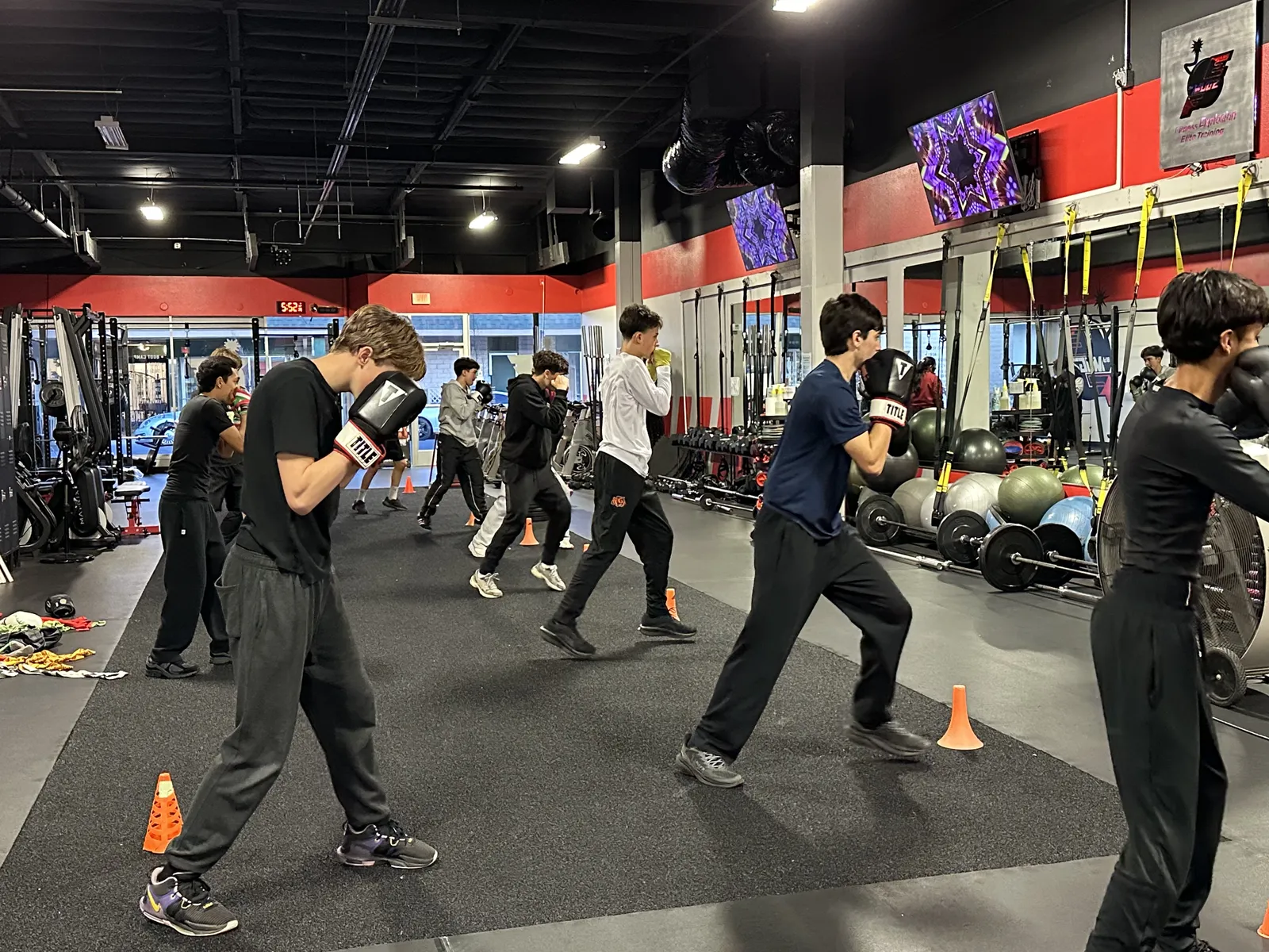 FE Boxing class — youth and teens training with boxing gloves